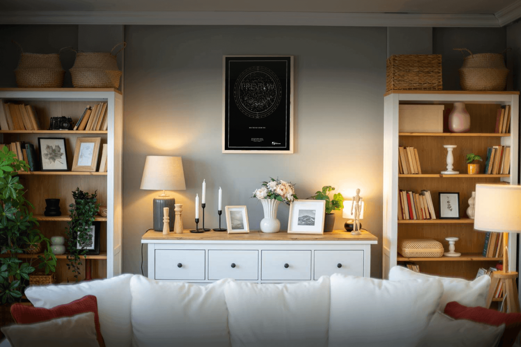 A framed StarGazze print styled in a living room.